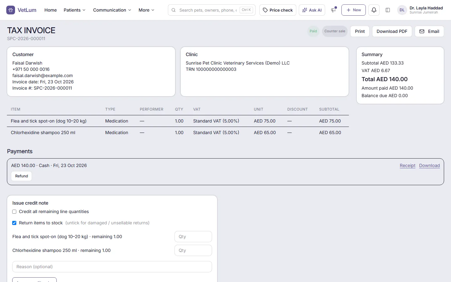 A tax invoice in AED with VAT, payment and credit note options.